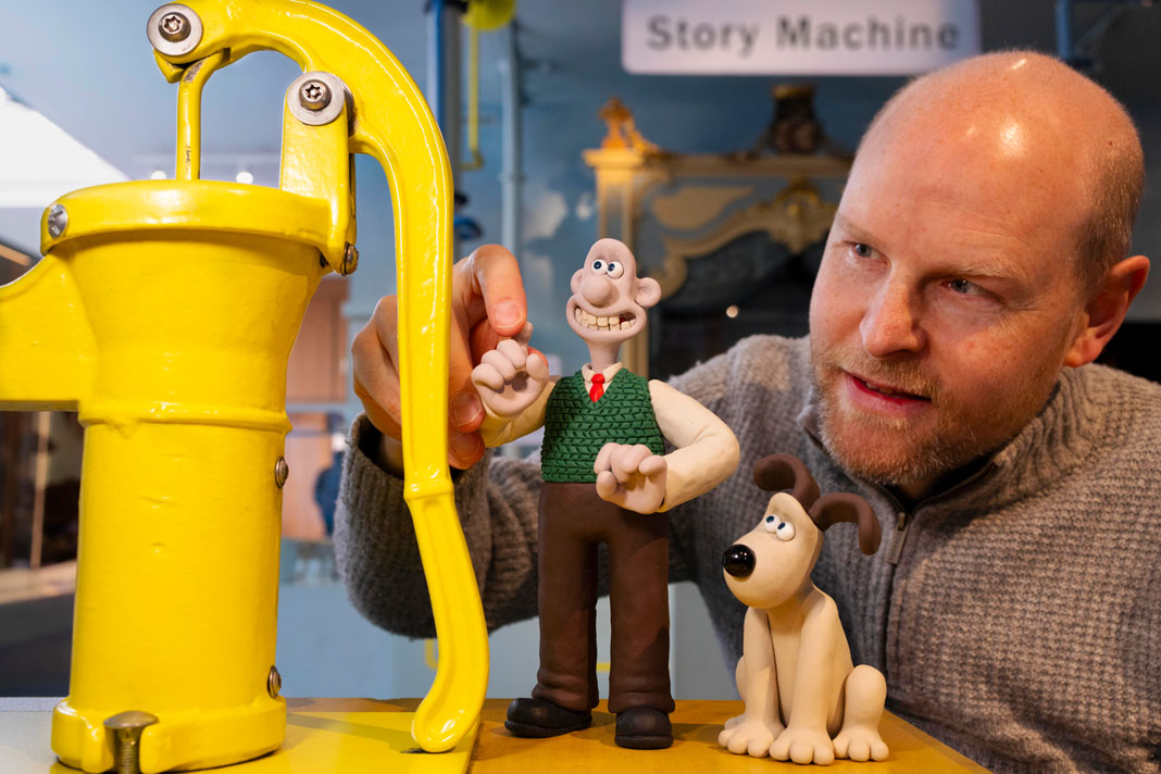 There is everything to love about Inside Aardman: Wallace & Gromit and Friends at the Young V&A. For one thing, it's about as multi-generational a day out as you can get in a museum. Grandparents and aunties can wax lyrical about the now truly vintage Morph (remember his first incarnation in Vision On?). Meanwhile, three generations can enjoy getting up close to Shaun the Sheep, the chickens from Chicken Run and, of course, those 'cracking' creations who delighted everyone, brought home a sidecar full of Oscars and other gongs and – so legend has it – worked wonders for sales of Wensleydale cheese around the globe. Aardman, the Bristol studio, is celebrating its 50th anniversary this year, so it's a really timely retrospective. Particularly welcome considering it lost a fair bit of its precious archive in a storage facility fire back in 2005. Thankfully, there is still plenty of treasure here on display, with over 150 exhibits, many of which have never been showcased before. For children – actually for any age – it's an eyeopener on the painstaking craft that goes into stop-motion animation. And, given Young V&A's remit to keep things interactive, there are lots of practical ways to learn more about the elements involved in an animated film. The first section of the exhibition explores developing ideas and storylines. Works in this section include development sketches for Morph and some of the original sketched incarnations of Wallace & Gromit. There's also a hand-drawn storyboard for the train chase scene in The Wrong Trousers, while an interactive praxinoscope shows how images are stacked in quick succession to create a stop-motion sequence. From here, the exhibition moves on to the business of model making, showing how characters, plots and miniature sets have been created. Highlights include Lady Tottington, the rocket from Wallace & Gromit: A Grand Day Out, and also the living room that is epicentre of Wallace's inventive musings. The duo's never-before-displayed motorcycle and sidecar is also on display, along with the galleon from 2012's The Pirates! In an Adventure with Scientists! – still the largest model Aardman has ever made. Other sections of the exhibition explore how all the elements of animation fit together, including lighting, sound and voice acting – and with behind-the-scenes videos and a daily planner to demonstrate how a filming schedule works. Visitors have the opportunity to create their own stop-motion sequences here, as well as lighting a set and filming live-action-videos – a technique used by animators to block out realistic movement for an animated scene. The final section of the exhibition looks at what happens after the production is wrapped, including adding music and special effects. Have-a-go moments here include creating Foley sound-design additions, such as the noise of footsteps, drawing, and so on. With a new Shaun the Sheep film scheduled for release in the autumn, it's good to know that Aardman is still hard at work creating movies and shorts to delight all ages. Going behind the scenes in this depth to see the many strands that make up an animated film is a rare treat. So too the chance to get right up close to the models for some of our favourite films. And for children and teenagers, it shines a light on the accessibility of this form of filmmaking. Inspiring stuff indeed or, as Wallace himself would say, a 'cracking' creation. * Inside Aardman: Wallace & Gromit and Friends is at Young V&A until 15th November 2026. An exhibition pass allowing repeat visits is £11; under 5s and V&A members go free, and concessions available. vam.ac.uk/young